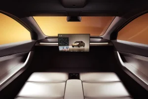 A conceptual driverless vehicle interior without a steering wheel or brake pedals.