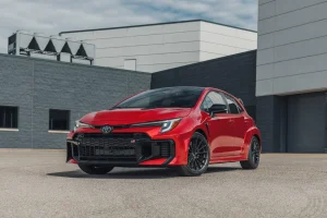 The 2026 Toyota GR Corolla driving on a winding track with rally-inspired handling.