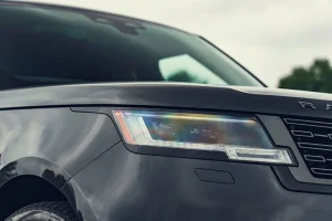 Exterior view of the 2026 Land Rover Range Rover P400 in motion
