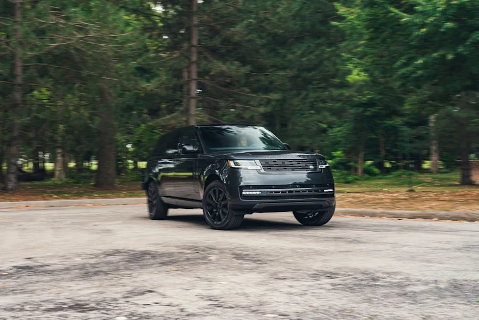 Exterior view of the 2026 Land Rover Range Rover P400 in motion