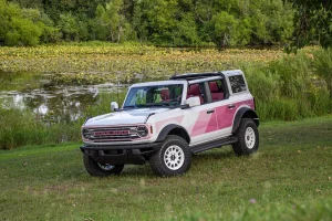 Ford Bronco Desert Rising edition with pink accents and white Method wheels