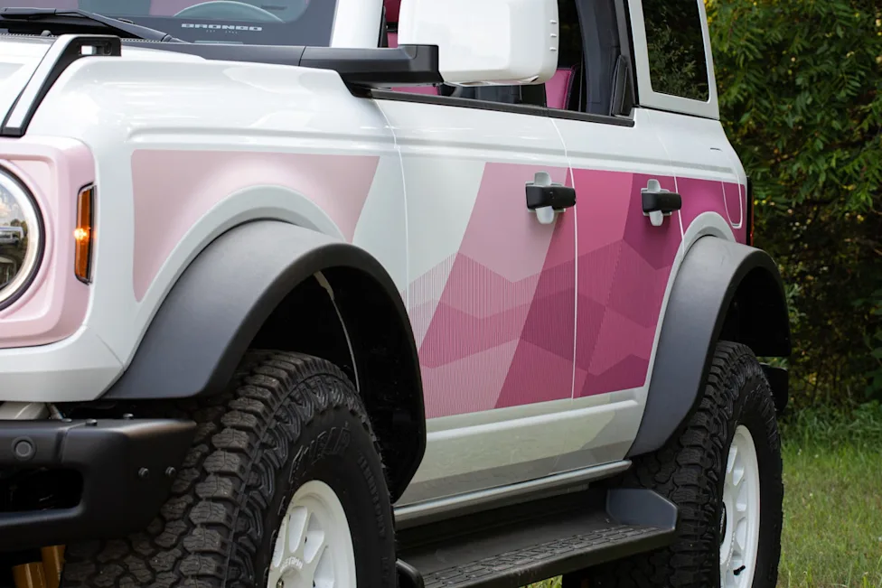 Ford Bronco Desert Rising edition with pink accents and white Method wheels