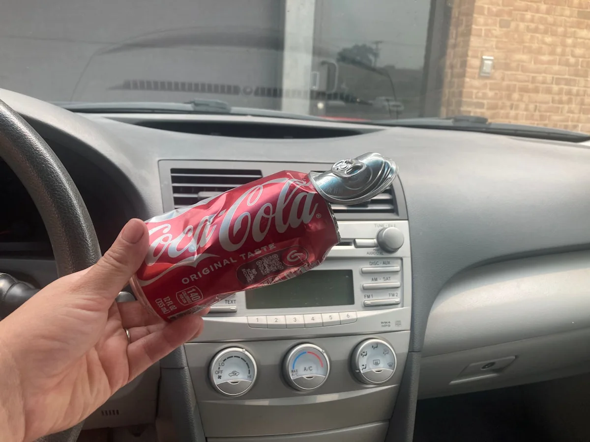 Kenmore Spotlite upholstery cleaner used to remove soda stains from a car headliner