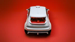 The Alpine A290 Lacoste Rallye electric hot hatch featuring a matte white exterior and red crocodile design details on the