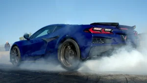 The high-performance Lucid Air Sapphire electric sedan showcasing its aerodynamic design during a high-speed track run.