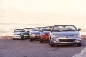 A group of 2001 four-seat convertibles parked during a comparison road test.