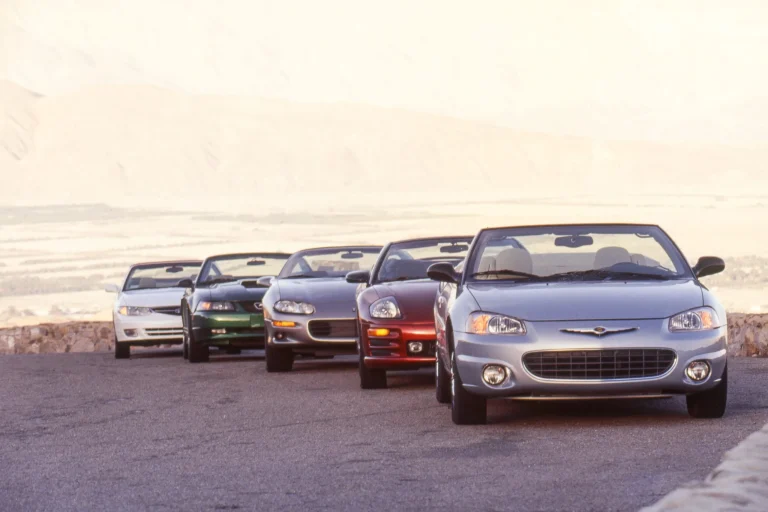A group of 2001 four-seat convertibles parked during a comparison road test.