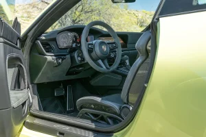 Interior view of the 2026 Porsche 911 GT3 featuring racing bucket seats and digital gauge cluster
