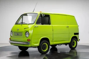 A front view of the rare metallic lime green 1969 Subaru Sambar 360 Van
