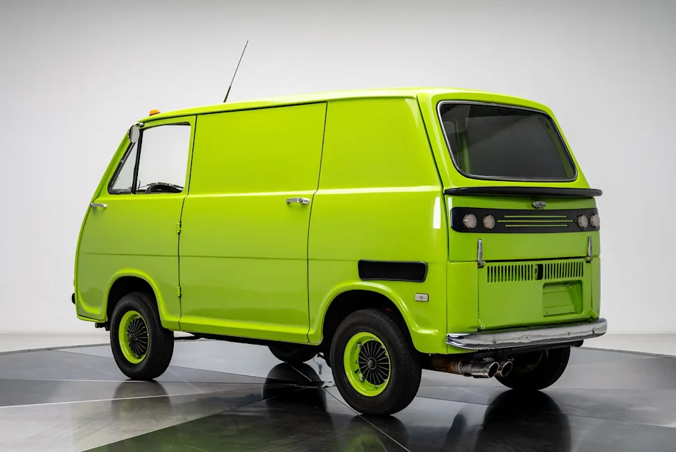 A front view of the rare metallic lime green 1969 Subaru Sambar 360 Van