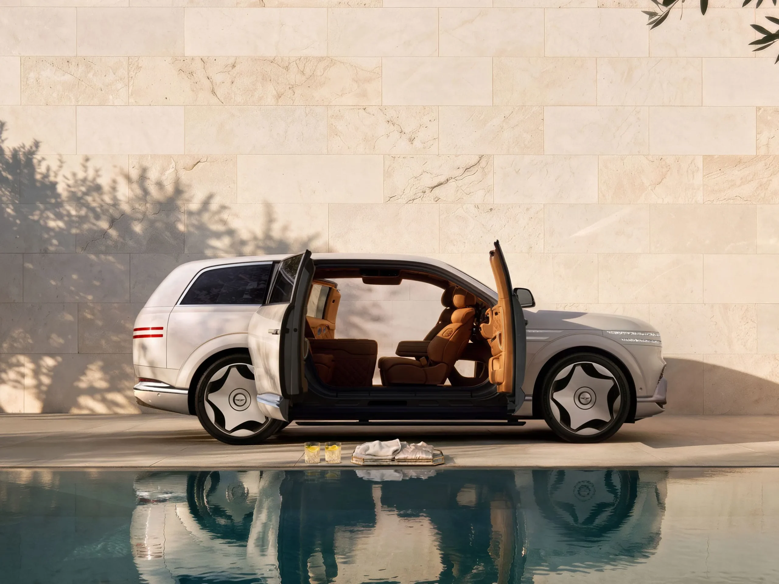 The ultra-luxury 2027 Genesis GV90 Neolun electric flagship SUV showcasing its rear-opening coach doors and premium cabin