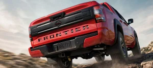 A close-up of the patriotic Stars and Stripes tailgate badge on the 2026 Nissan Frontier Pro-4X