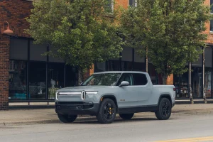 A modern Rivian electric vehicle parked outdoors showcasing its design.