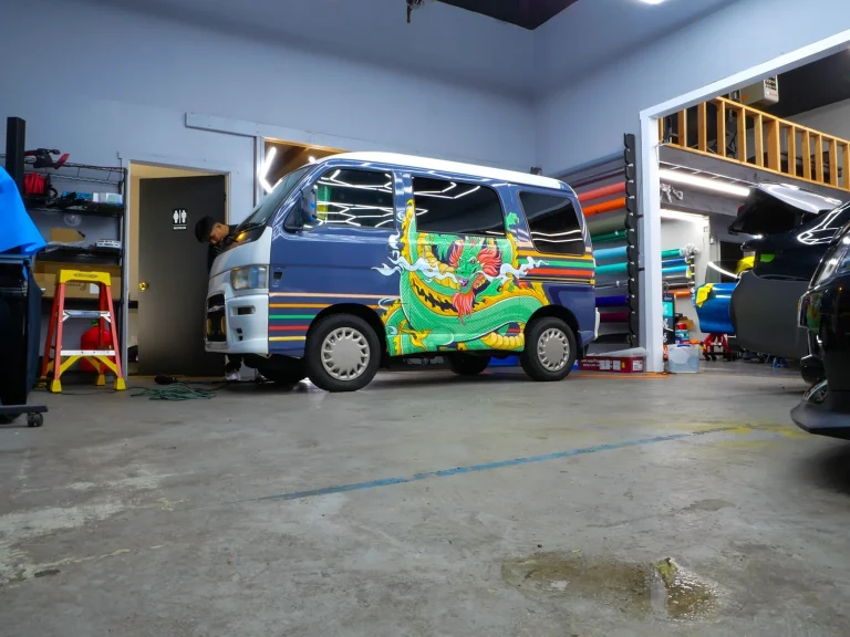 Jorma Taccone's custom dragon-wrapped 1996 Daihatsu Atrai JDM kei van