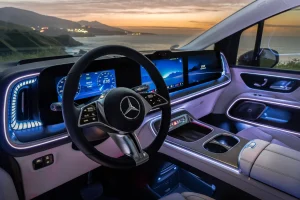 Luxurious interior cabin of the 2028 Mercedes-Benz VLE-Class EV showing dashboard screens and executive seats