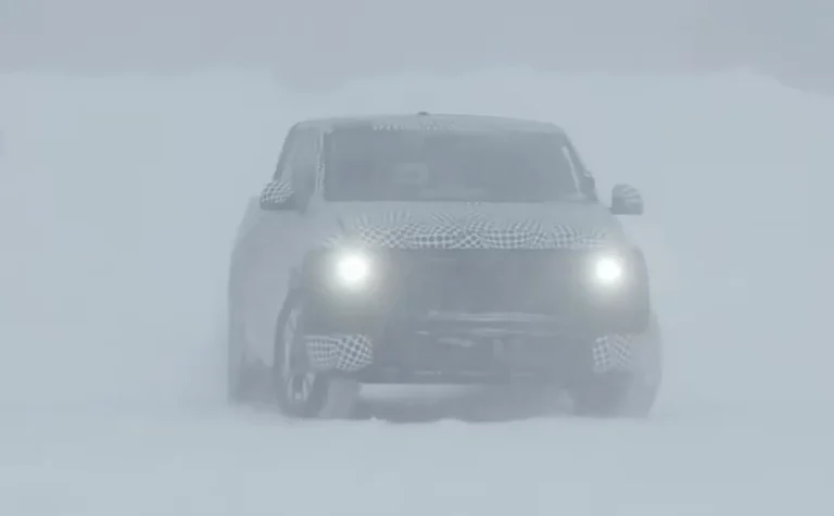 Prototype of the upcoming Ford electric pickup truck covered in camouflage