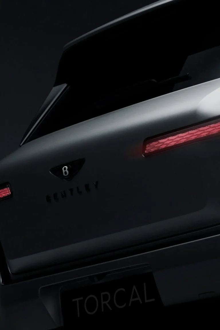 Rear teaser view of the upcoming Bentley Torcal electric SUV showing its diamond-like taillights.
