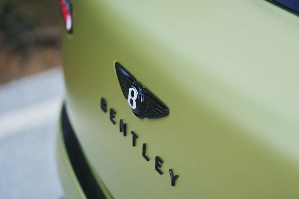 Teaser preview of the rear end and hood of the 2028 Bentley Torcal electric SUV