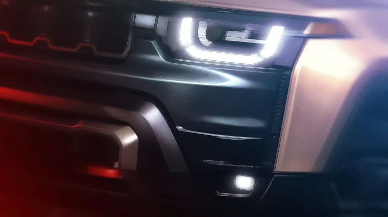 The front fascia of the Jeep Cherokee Upland concept featuring red tow hooks.