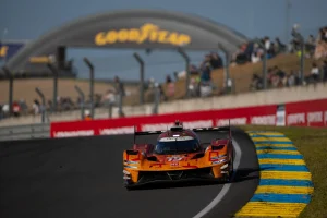 The Genesis Magma Racing GMR-001 hypercar competing on the track at the 24 Hours of Le Mans