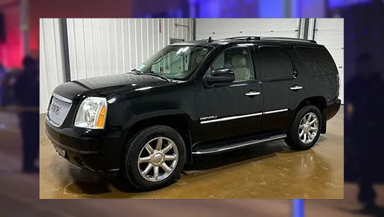 A black GMC Yukon SUV similar to the vehicle wanted in connection with the fatal hit-and-run in Milwaukee.