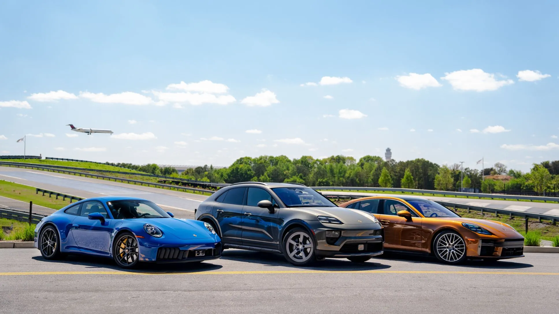 A collection of various Porsche models including the 911 and Taycan