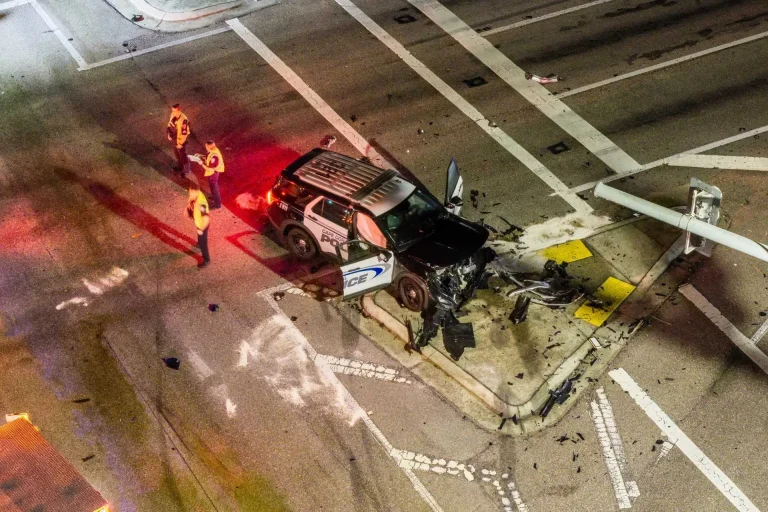 Damaged police cruiser and vehicle at the intersection of Santa Barbara Boulevard and Veterans Parkway in Cape Coral