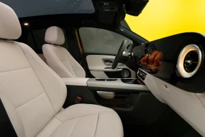 Interior cabin view of the redesigned 2028 Mercedes-Benz GLA-Class featuring a full-width screen display