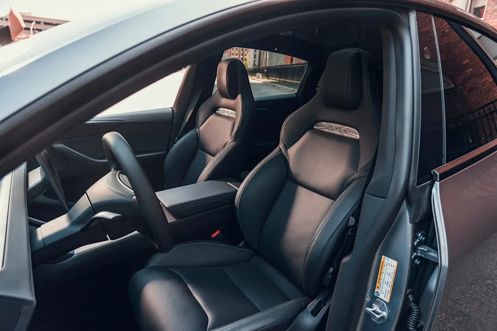 Interior dashboard and bolstered seats of the 2026 Tesla Model Y Performance