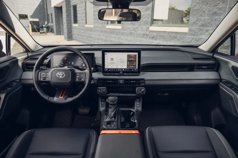 Interior dashboard and center console of the 2026 Toyota RAV4 Woodland PHEV