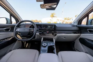 Interior view of the 2026 Kia Sportage Hybrid SX-Prestige showing the dashboard and steering wheel