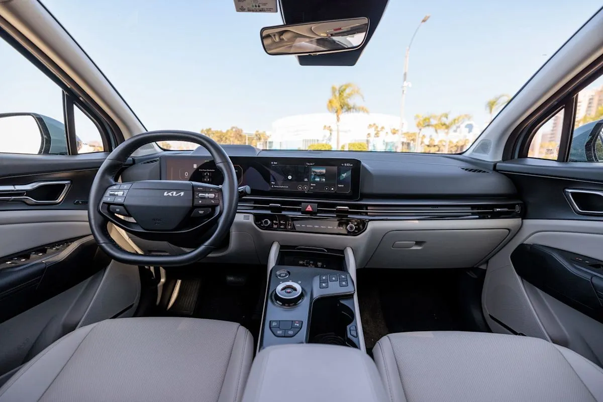 Interior view of the 2026 Kia Sportage Hybrid SX-Prestige showing the dashboard and steering wheel