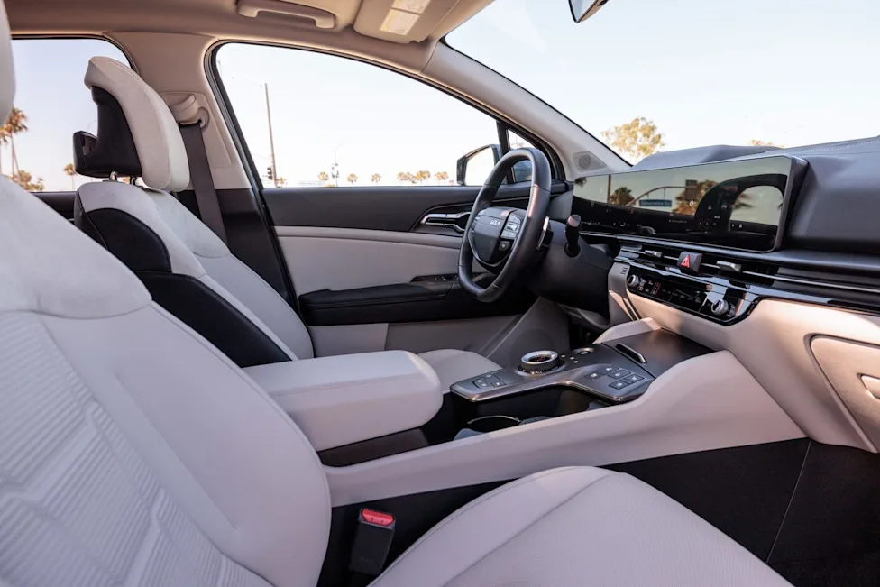 Interior view of the 2026 Kia Sportage Hybrid SX-Prestige showing the dashboard and steering wheel