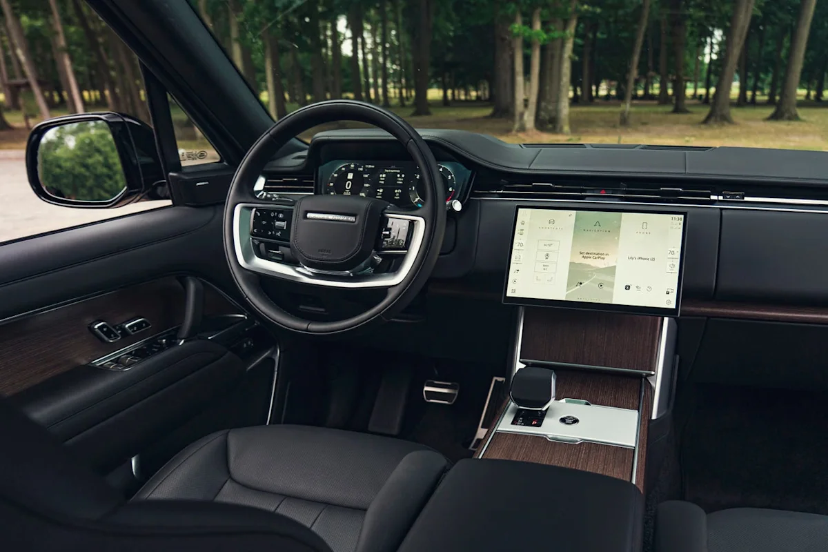 Interior view of the 2026 Land Rover Range Rover featuring Pivi Pro touchscreen