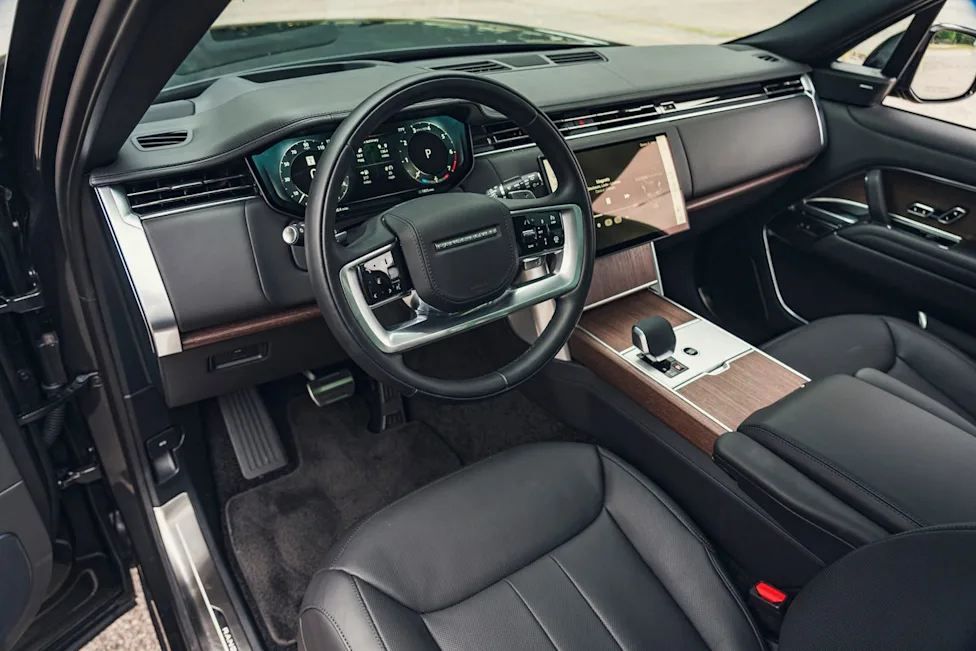 Interior view of the 2026 Land Rover Range Rover featuring Pivi Pro touchscreen