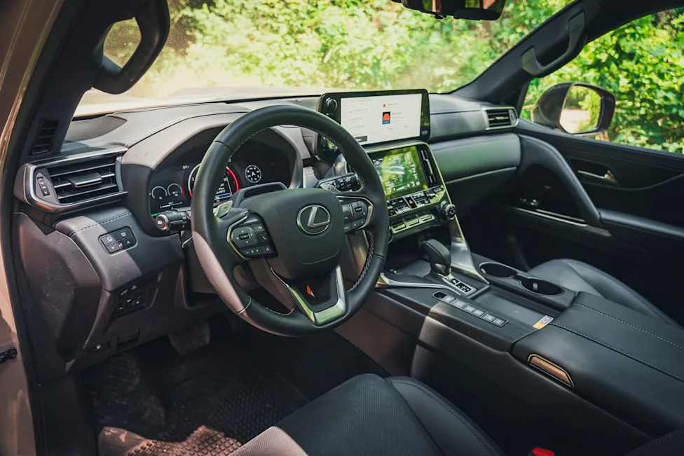 Interior view of the 2026 Lexus LX700h Overtrail showing dashboard displays and seating