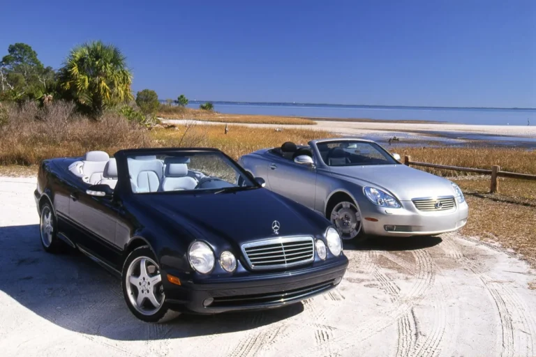 The 2001 Lexus SC430 and Mercedes-Benz CLK430 parked side-by-side during a road test.