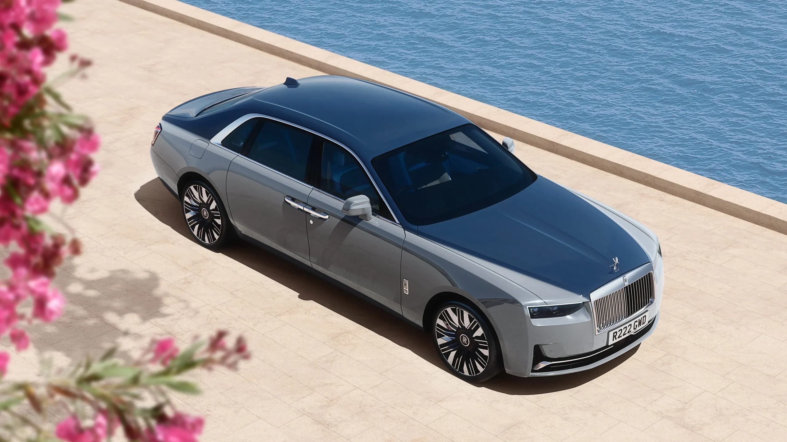 The front profile of the redesigned 2027 Mercedes-Maybach S-Class luxury sedan highlighting its larger illuminated grille