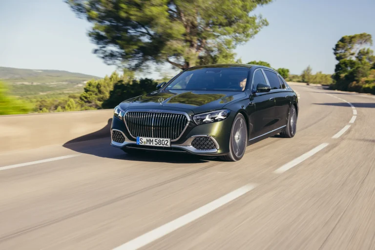 The front profile of the redesigned 2027 Mercedes-Maybach S-Class luxury sedan highlighting its larger illuminated grille