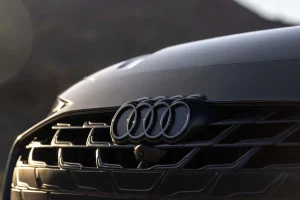 The interior design of a modern Audi vehicle focusing on the dashboard and center console