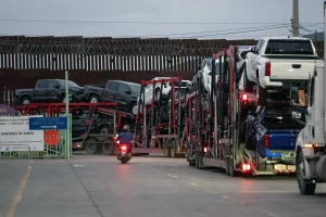 The United States, Mexico, and Canada flags representing the USMCA trade agreement