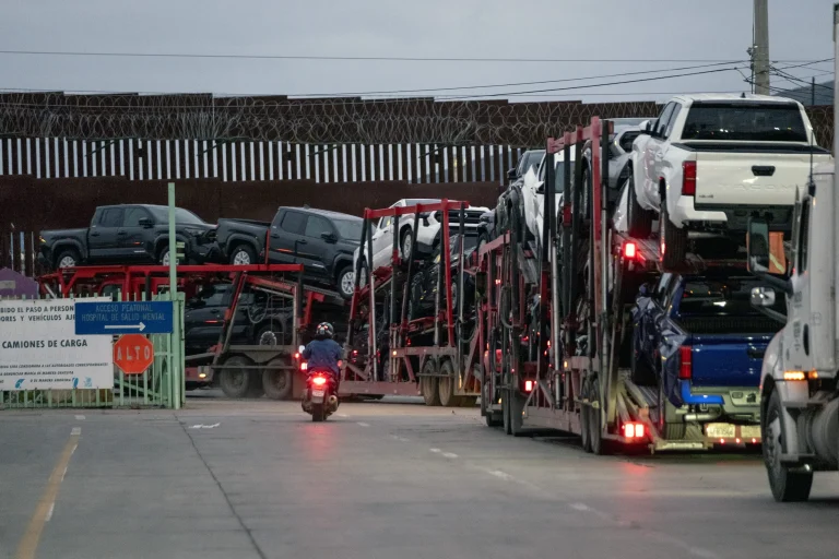 The United States, Mexico, and Canada flags representing the USMCA trade agreement