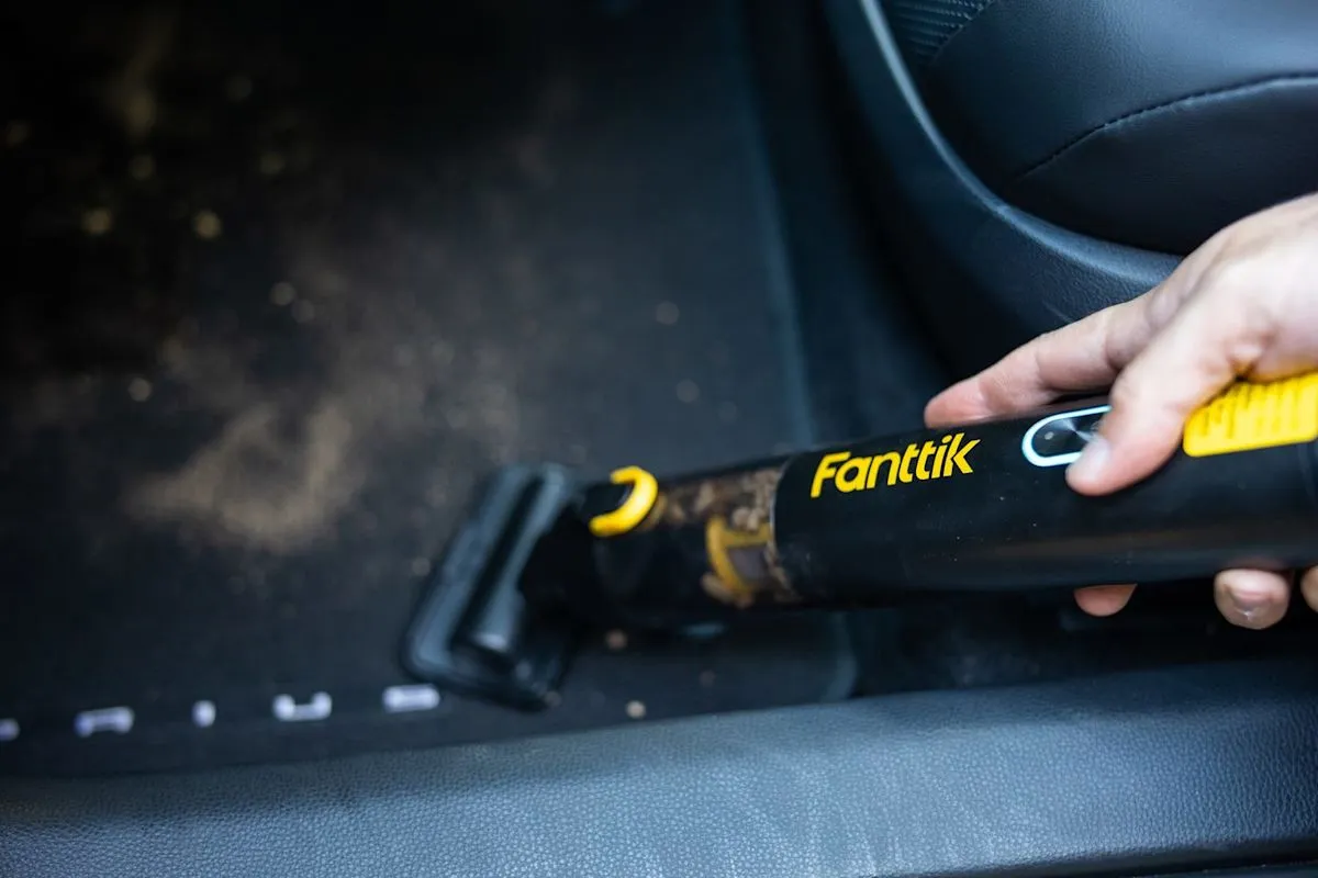 A selection of compact cordless car vacuums tested on vehicle floor mats