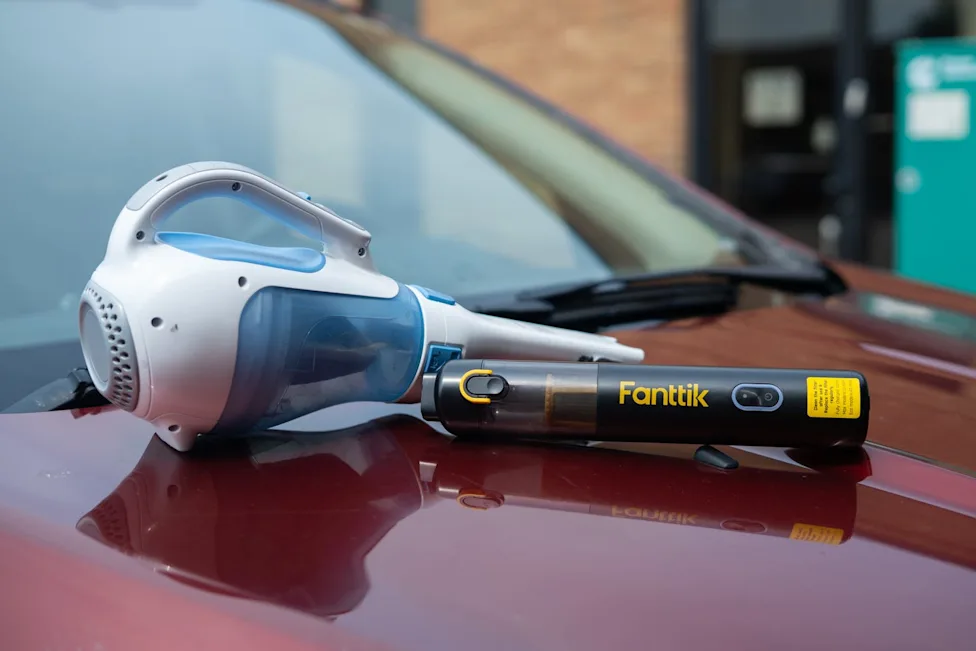 A selection of compact cordless car vacuums tested on vehicle floor mats