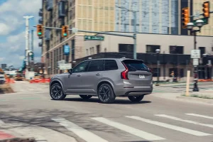 A silver 2026 Volvo XC90 B6 Ultra driving on a highway during a long-term test update.