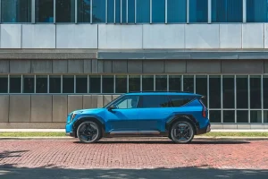 An electric Kia EV9 SUV parked outdoors