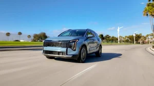 Front view of the redesigned 2026 Kia Sportage Hybrid showing its new Telluride-style grille