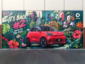 Hand-painted mural showcasing the design of the new Smart #2 electric car