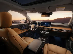 Inside the cabin of the 2027 Lincoln Corsair Hybrid showing the dashboard and infotainment screen