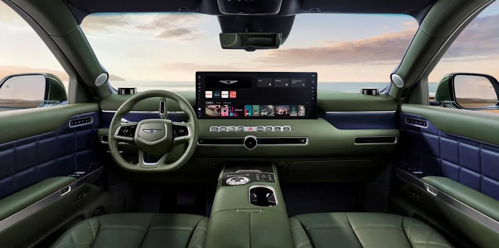 Luxurious interior of the 2027 Genesis GV90 electric SUV featuring swiveling front seats and a spacious cabin layout.